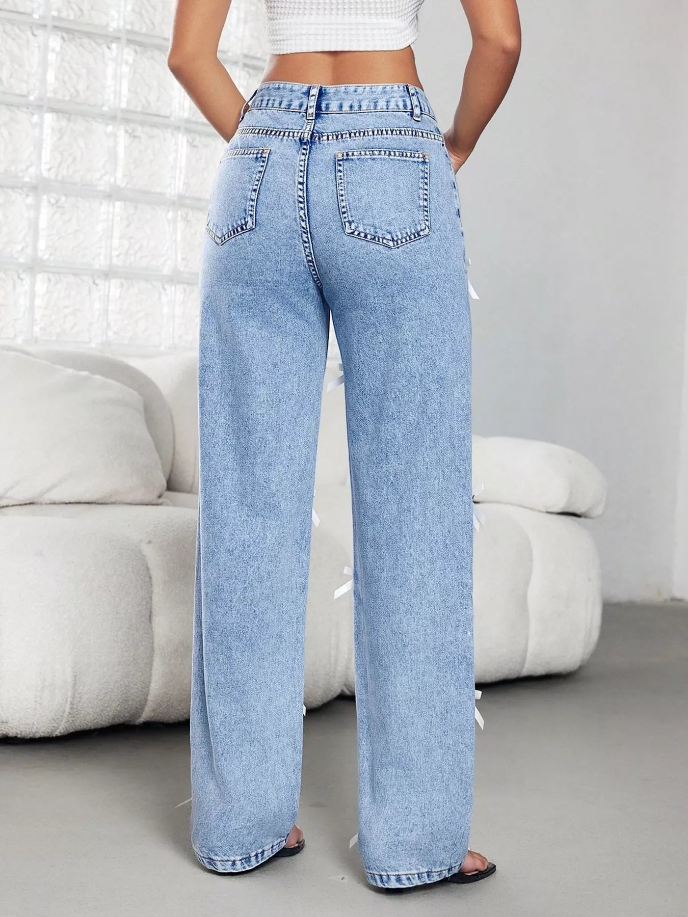 Jean taille haute à jambes larges avec nœud Elégance District