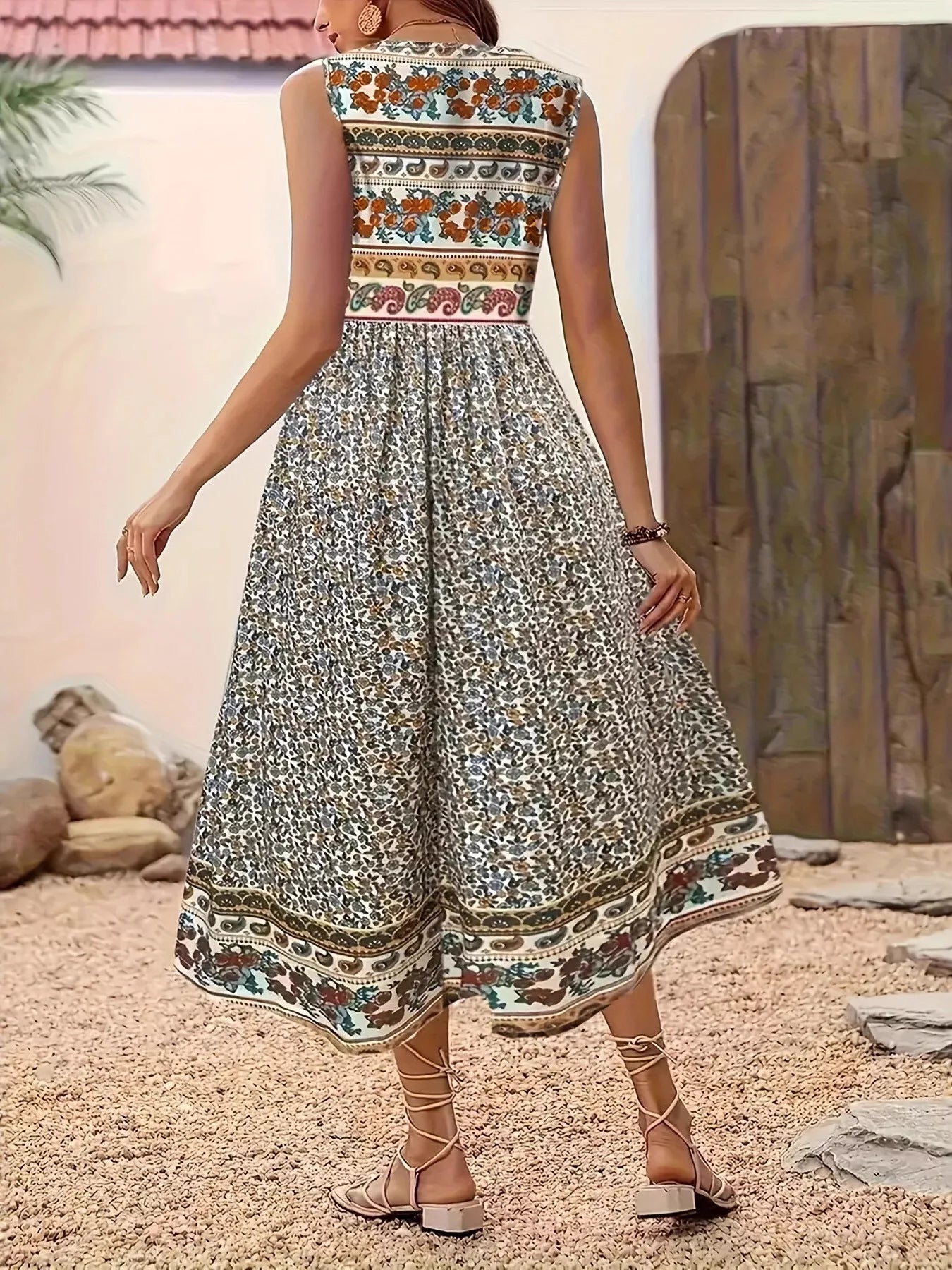 Robe midi sans manches à imprimé floral grande taille   Elégance District