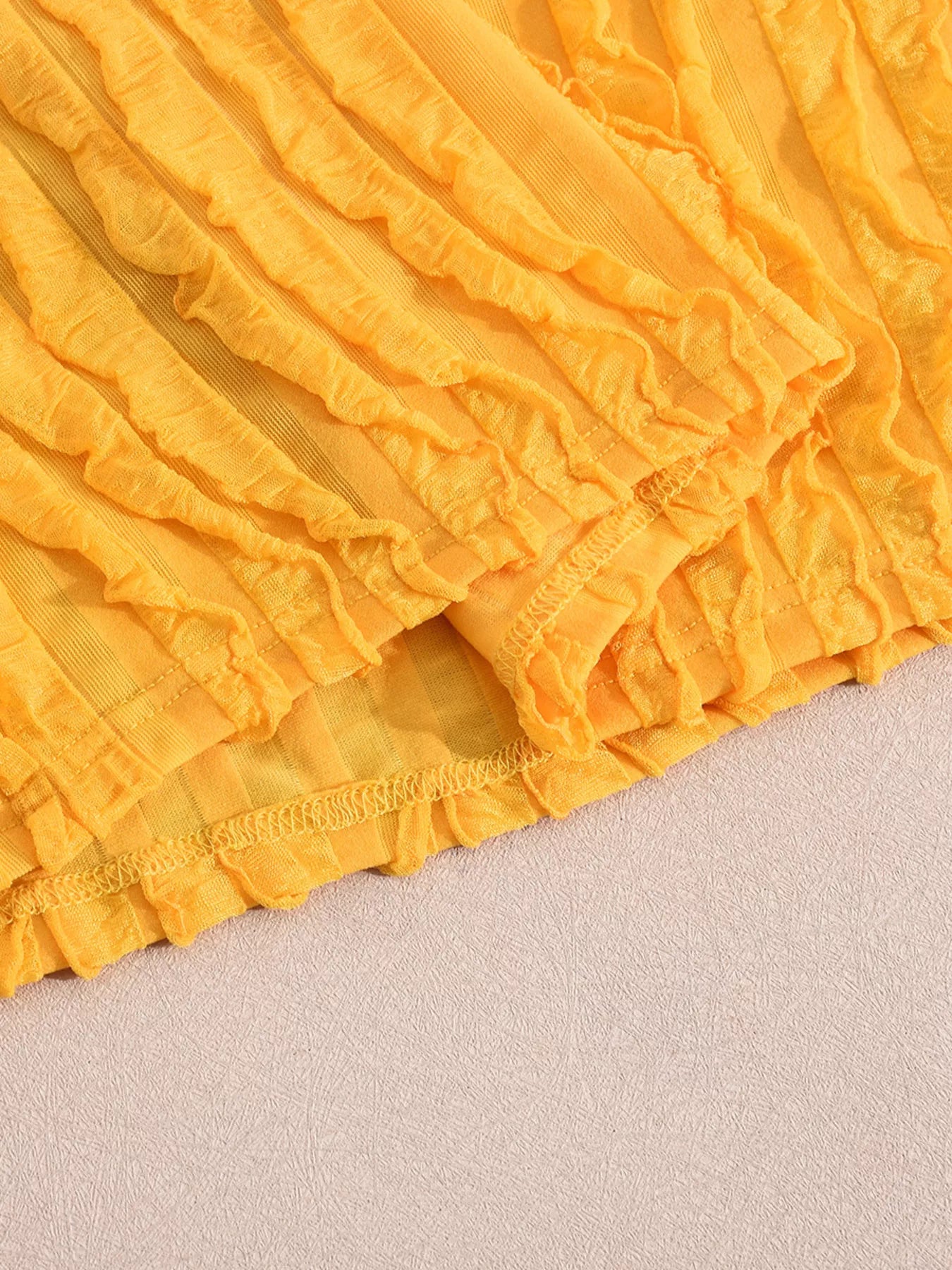 Robe longue moulante texturée à col Halter  Elégance District