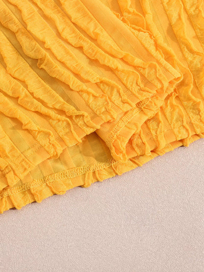 Robe longue moulante texturée à col Halter  Elégance District
