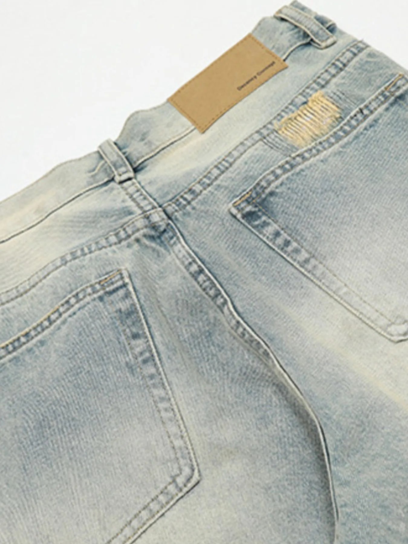 Jean vintage délavé à jambes larges pour homme   Elégance District