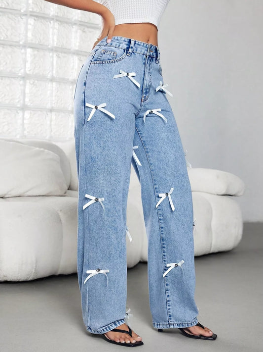 Jean taille haute à jambes larges avec nœud   Elégance District