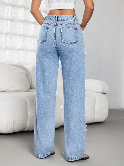 Jean taille haute à jambes larges avec nœud   Elégance District
