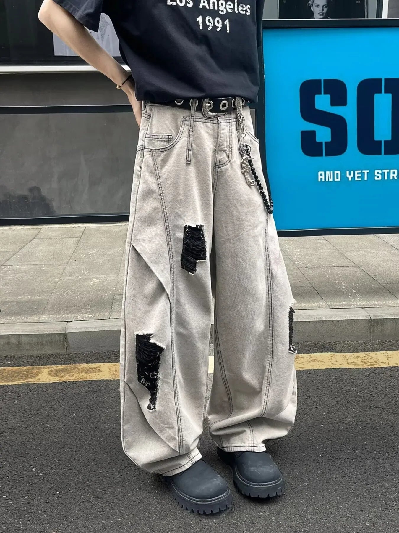 Jean homme grande taille à jambes larges et effet usé    Elégance District