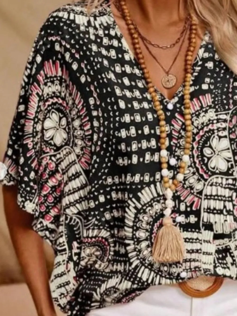 Chemise  imprimée à col en V et manches courtes    Elégance District