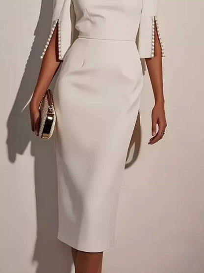 Robe midi élégante et cintrée à manches fendues ornées de perles   Elégance District
