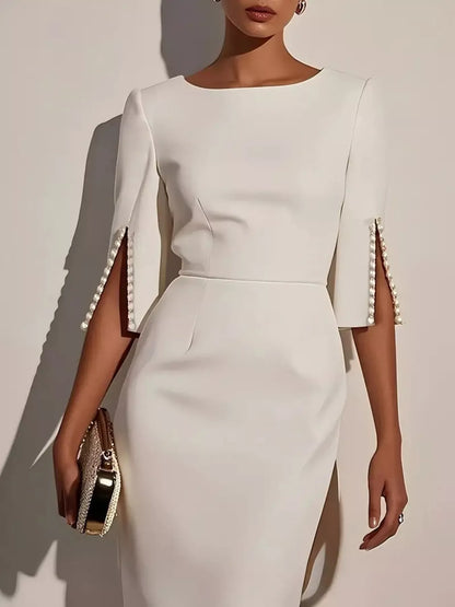 Robe midi élégante et cintrée à manches fendues ornées de perles   Elégance District
