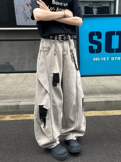 Jean homme grande taille à jambes larges et effet usé    Elégance District