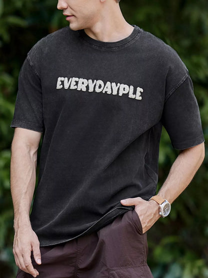 T-shirt à col rond avec motif de lettres   Elégance District