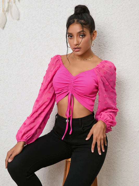 Blouse courte à cordon de serrage et à pois suisses  Elégance District