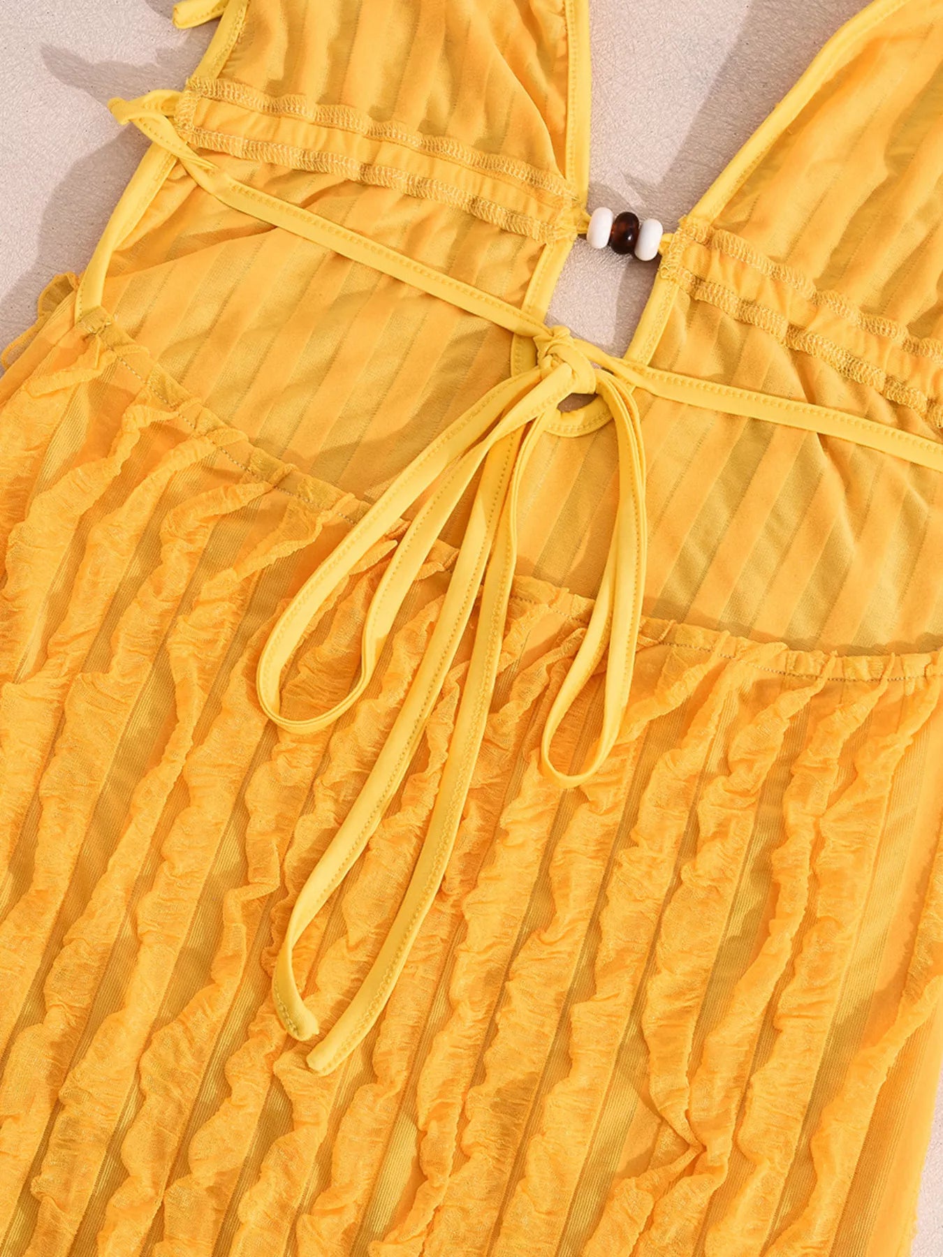 Robe longue moulante texturée à col Halter  Elégance District